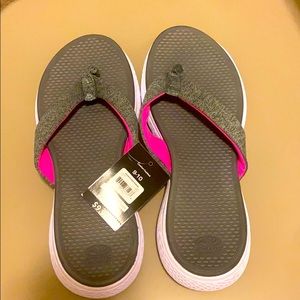 Brand new size 9-10 woman’s flip flops